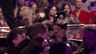 Group In Dark Room With Camera GIF