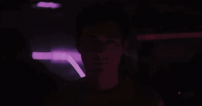 Group In Dark Room With FX Shirts GIF