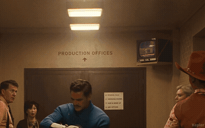 Group In Fantastic Four Costumes Running In Hallway GIF