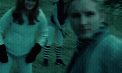Group In Field With NY Baseball Cap GIF