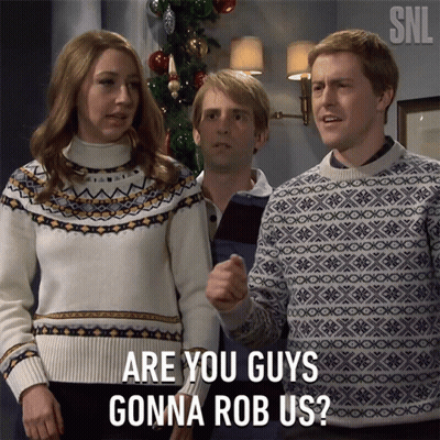 Group In Front Of Christmas Tree Saying Are You Guys Gonna Rob Us GIF