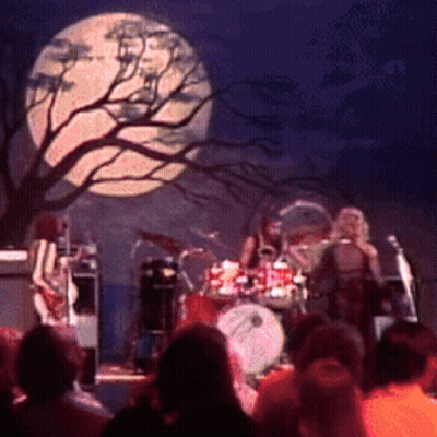 Group In Front Of House Man Wearing CBS Shirt GIF