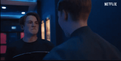 Group In Front Of Red Pilot Movie Poster GIF