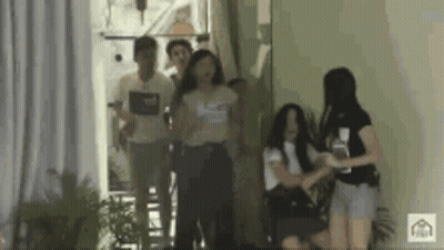 Group in Hallway One Wearing Abercrombie Shirt