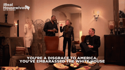 Group In Living Room Saying You're A Disgrace To America GIF