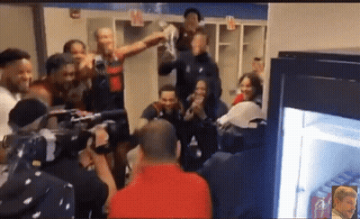 Group In Locker Room With Coca Cola Fridge GIF