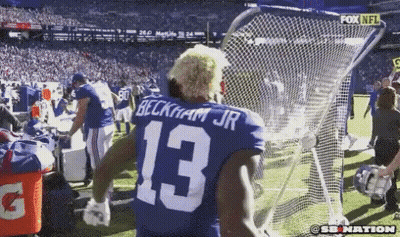 Group In Locker Room With Man In NFL Hoodie GIF