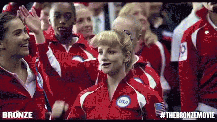 Group In Red Jackets With USA GIF