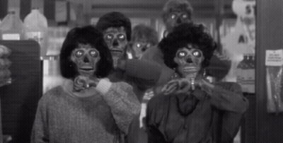 Group In Skeleton Masks Black And White Photo GIF
