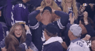 Group In Stadium Watching Game With Number 30 Jersey GIF