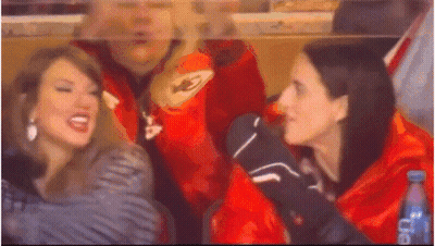 Group In Stadium With Red Jacket Letter A GIF
