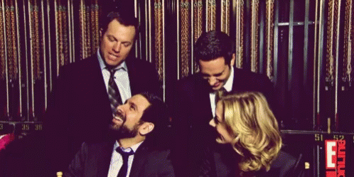 Group In Suits Laughing GIF