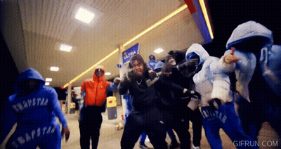 Group In Trapstar Sweatshirts Dancing At Gas Station GIF
