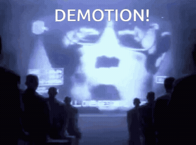 Group Looking At Screen Saying Demotion GIF