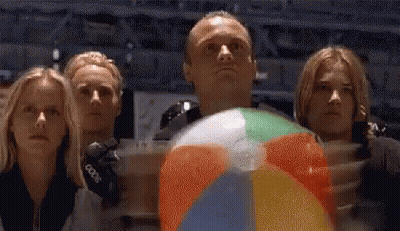 Group Looking Up At Man Holding Beach Ball GIF