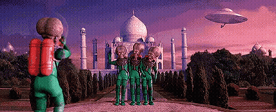 Group Of Aliens Standing In Front Of Temple GIF