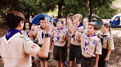 Group Of Boy Scouts Gathered In Circle GIF