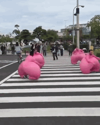 Group Of Boys Bounce It In Pedestrian Lane GIF