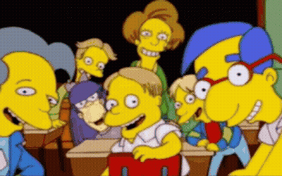Group Of Cartoon Characters Smiling In Classroom GIF