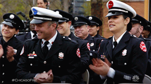 Group Of Chicago Firefighters Applauding In Uniforms GIF