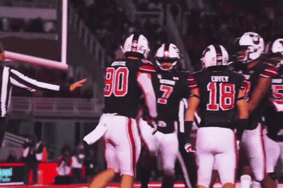 Group Of Football Players Including Number 18 GIF