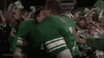 Group Of Football Players Standing Next To Each Other GIF