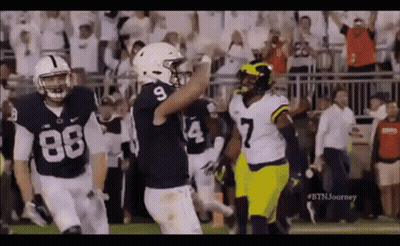 Group Of Football Players Standing On Field GIF