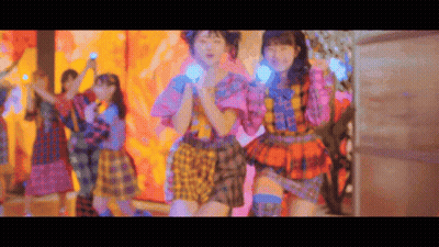 Group Of Girls In Colorful Dresses Dancing GIF