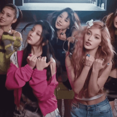 Group Of Girls Posing One In Pink Jacket GIF