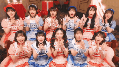 Group Of Girls Posing, One In Red Hat GIF