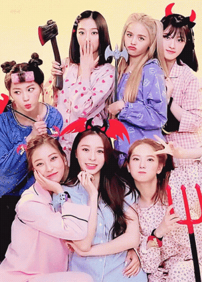 Group Of Girls Posing With Devil Costume GIF