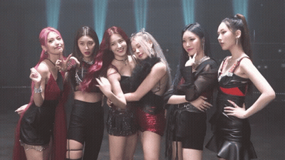 Group Of Girls Posing With Korean Writing GIF