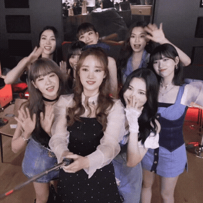 Group Of Girls Posing With Selfie Stick GIF
