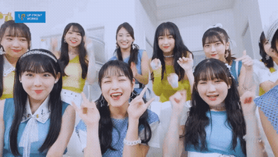 Group Of Girls Posing With Up Front Works Sign GIF
