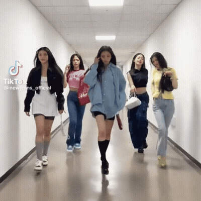 Group Of Girls Walking Down Hallway With TikTok GIF