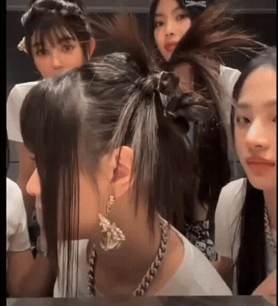Group Of Girls With Ponytails Sitting At Table GIF