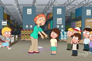 Group Of Kids Standing Around Woman In Warehouse GIF