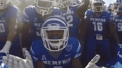 Group Of Memphis Football Players In Blue Uniforms GIF