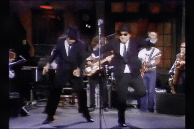 Group Of Men Dancing On Stage GIF