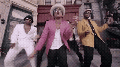 Group of Men Dancing on Street