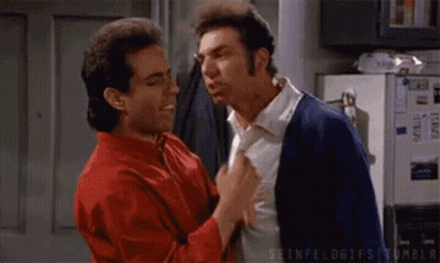 Group Of Men Dancing On Street In Front Of Building GIF