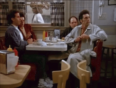 Group Of Men Eating At Diner Table GIF