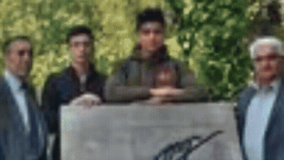 Group Of Men Holding Large Painting GIF