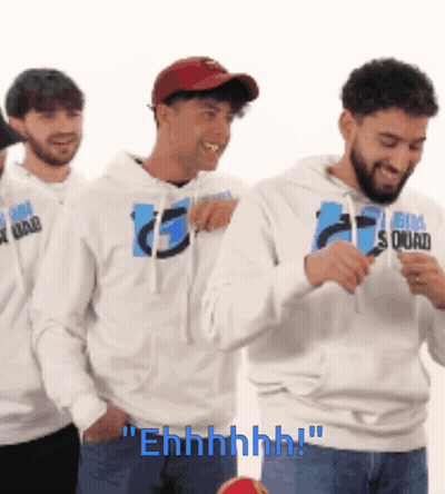 Group Of Men In Big Squad Sweatshirts Standing In Line GIF