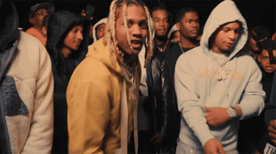 Group Of Men In Dark Room One Wearing Dirty Hoodie GIF