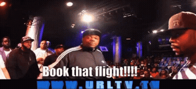 Group Of Men In Front Of Crowd Saying Book That Flight GIF