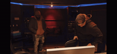 Group Of Men In Front Of Laughterhouse Logo GIF