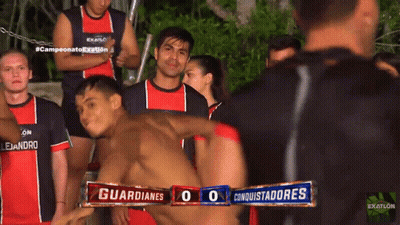 Group Of Men In Red And Black Exatlon Shirts GIF