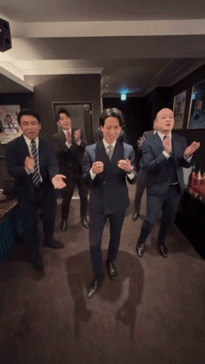 Group Of Men In Suits Dancing GIF