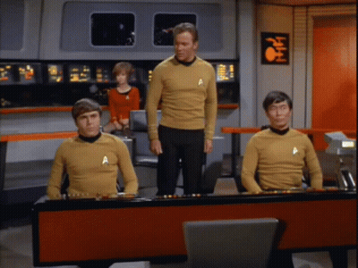 Group Of Men In Yellow Shirts With A GIF
